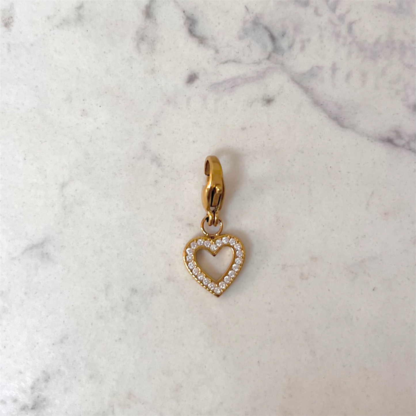 Zircon heart charm