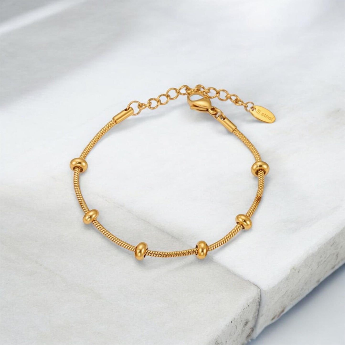 Segmented charm bracelet