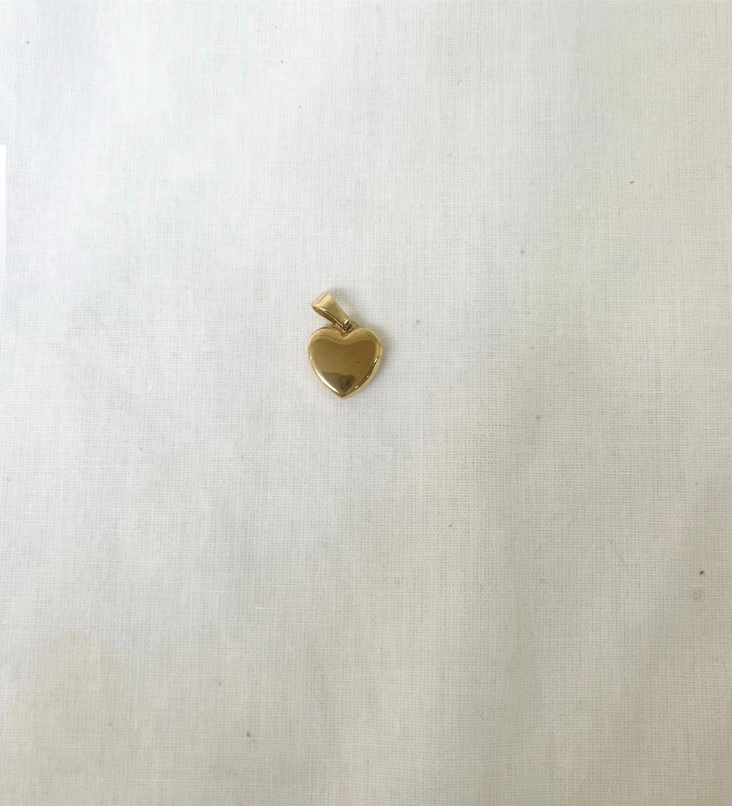 Solid heart charm