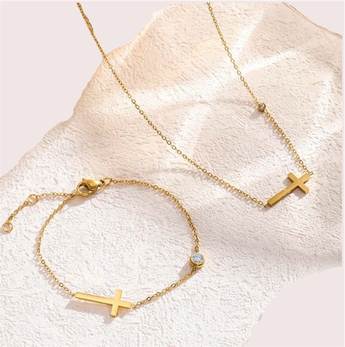 Side cross diamanté bracelet and necklace